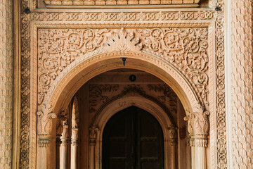 ancient Indian temple arches fragment,The sacred building carved from stone, Ancient rock curved temples of Hindu Gods at vrindavan

