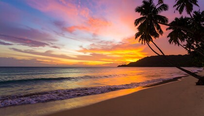 A tropical beach at sunset, showcasing a vibrant array of colors in the sky and ocean, with swaying palm trees silhouetted against the golden hour light.