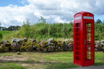English red telephone box in the garden