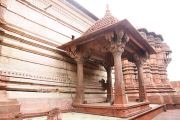 ancient Indian temple arches fragment,The sacred building carved from stone, Ancient rock curved temples of Hindu Gods at vrindavan
