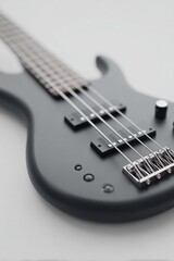 Fototapeta premium Sleek black bass guitar showcases modern design and intricate de