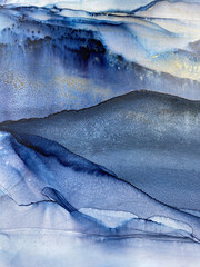 Abstract blue background with gold — fluid art texture made with alcohol ink and golden potal. Beautiful smudge and stains. Blue with purple natural art backdrop resembles watercolor or aquarelle.