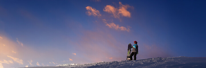 Snowboarder at Dawn on Snowy Hill Wide Banner