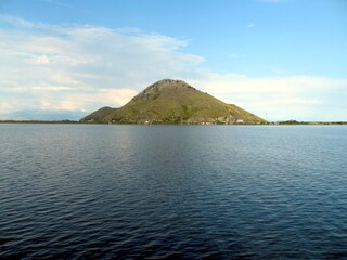 Explore Breathtaking Skadar Lake in Montenegro, Where Serene Waters Meet Majestic Mountains at Dawn