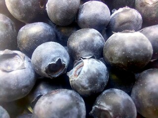 Fresh Blueberries Clustered Together Displaying Rich Color and Natural Texture