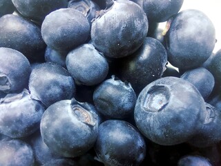 Fresh Blueberries Piled Together for a Vibrant Display of Color and Texture