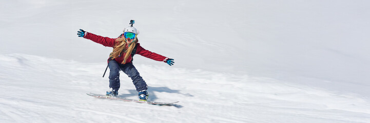 Excited Snowboarder in Action Wide Banner with Copy Space