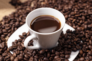 Coffee cup and roasted beans