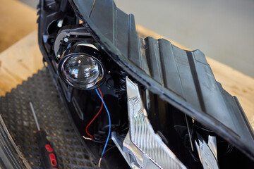 Careful precision is essential when installing a car headlight assembly for optimal performance