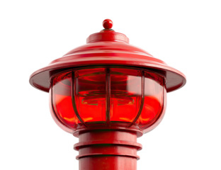 Close-up of a red warning light fixture.  A round, red, metal lamp with a clear glass dome, emitting a bright red light.  The fixture is mounted on a vertical post