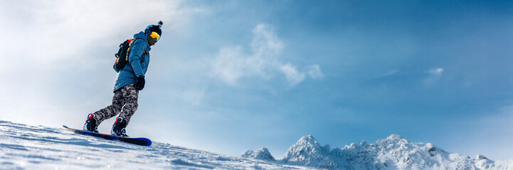 Snowboarder on Mountain Wide Banner with Copy Space