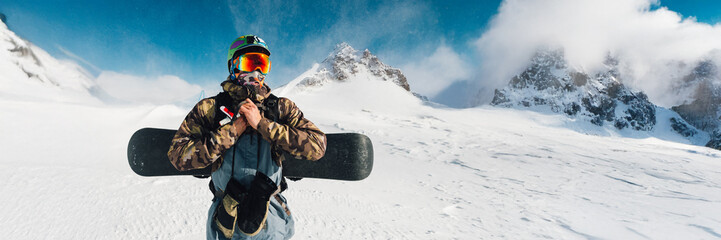 Snowboarder in Mountain Landscape Wide Banner