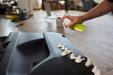 Cleaning with Spray in a Modern Workspace Setup for Enhanced Productivity and Hygiene