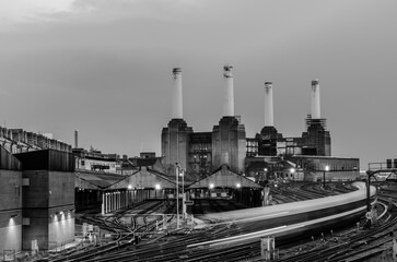 Trains pass Battersea Power Station