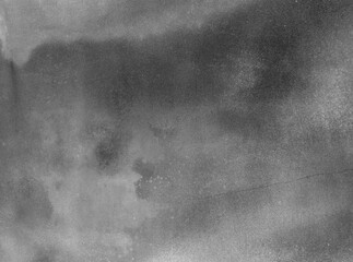 Wet Plaster Surface. Dark Gray Concrete Wall Irregular Texture. Rough Painted Textured Surface. Dark Gray Concrete Backgroud. Close up. Plaster Wall with Visible Irregular Stained Surface. 