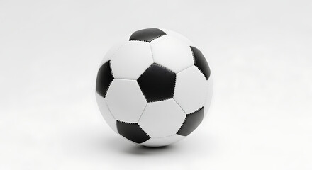 Naklejka premium A classic black and white soccer ball isolated on a clean white background, representing sports, games, and competition.