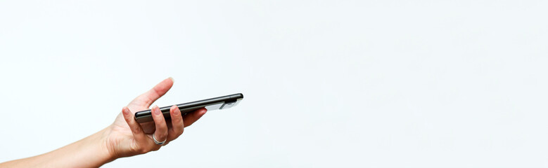 banner with a clean white background and a hand holding a phone. hand holding phone white...