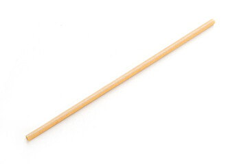 Single biodegradable drinking straw lying on white background