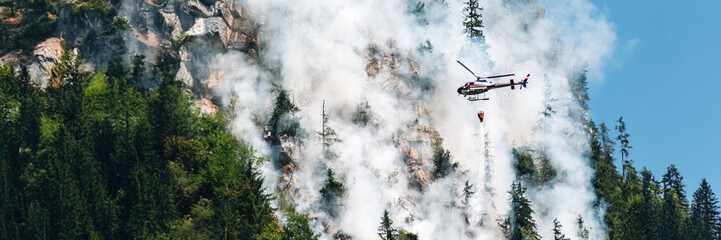 Helicopter Fighting Forest Fire Wide Banner