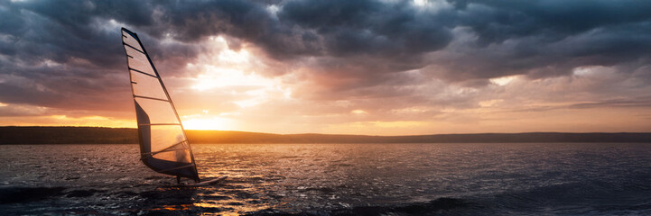 Windsurfer at Sunset Wide Banner with Copy Space