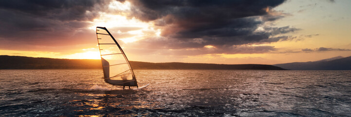 Windsurfing at Sunset on Wide Banner