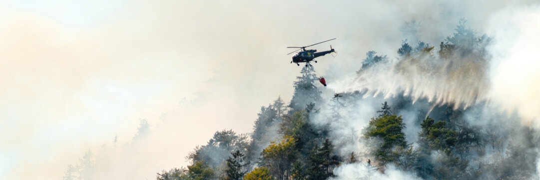 Helicopter Fighting Forest Fire Wide Banner