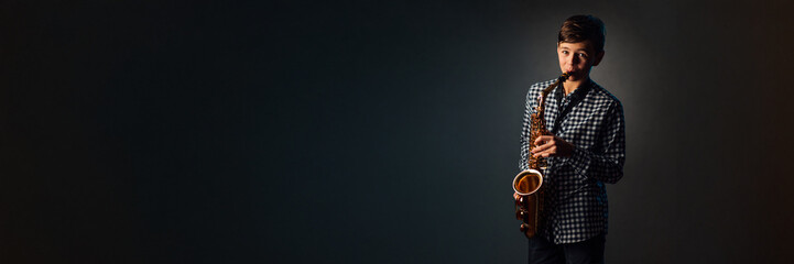 Young Saxophonist Portrait Wide Banner with Copy Space