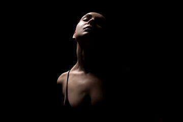 Female silhouette in dark. Beautiful passion Girl