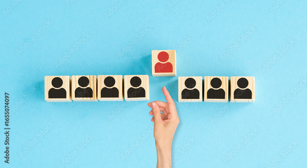 Aufkleber a hand pointing at a red block with a person on it