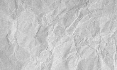 Creased paper background texture. Gray color. Full frame