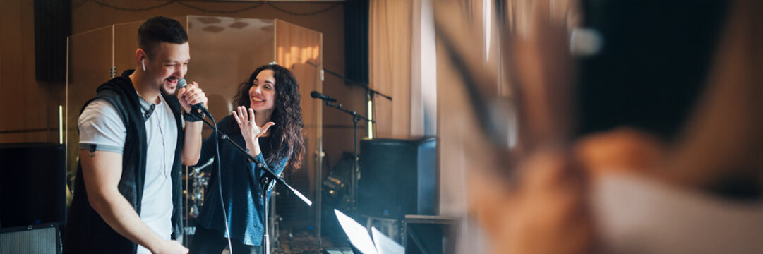 Musicians Rehearsing in Studio Wide Banner