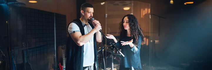 Musicians Rehearsing in Studio Wide Banner