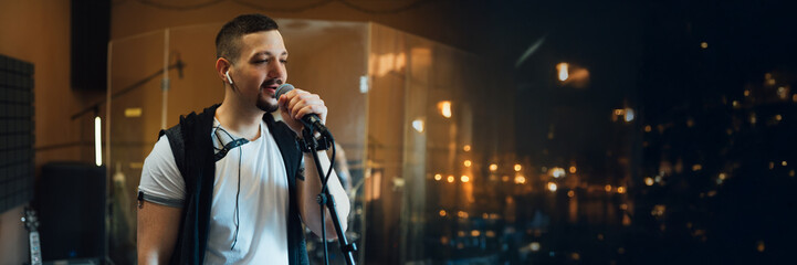 Singer Performing on Stage Wide Banner with Copy Space