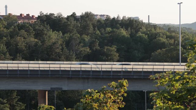 Stockholm, Sweden Traffic at sunset on the E4 elevated highway known as Essingeleden. 