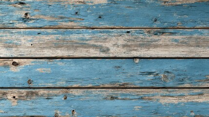 Weathered, close-up shot of horizontally arranged wood planks, painted blue with worn texture