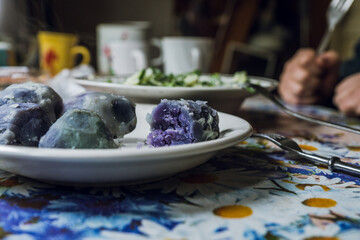 Country breakfast with boiled potatoes and fresh salad. Everyday life in  country. Selective focus.