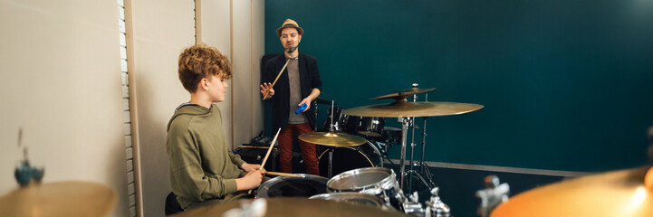 Drum Lesson Scene in Studio Wide Banner with Copy Space