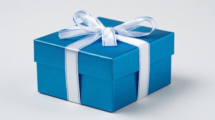 Obraz premium Elegant Blue Gift Box with White Ribbon on White Background