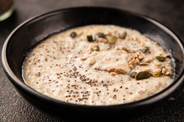 Chia pudding fruit puree tasty snack fresh delicious gourmet food background on the table rustic...
