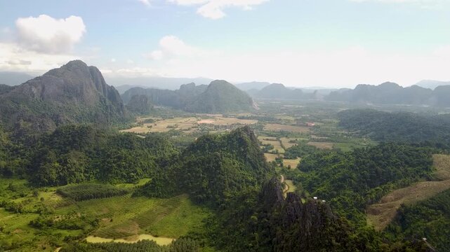 Aerial drone view of Vang Vieng valley and karst mountains in Laos