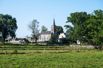 Rural landscape and green farmland in the village of Libramont, Province de Luxembourg, Belgium