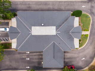 Sunny Daytime Top Down Drone Image of a Commercial Building with Asphalt Shingles