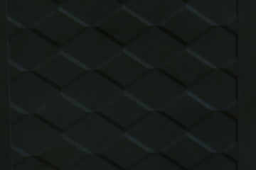 Black stitched leather texture on dark background