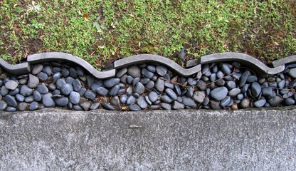 Japanese Garden Walkway with a Curved Tile Rock Border