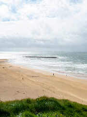 Ballybunion waves and people on the beach