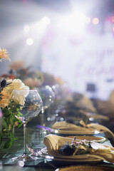 Elegant wine glass on decorated banquet table