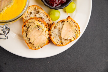 Foie gras goose liver appetizer delicacy fresh delicious gourmet food background on the table rustic food top view copy space