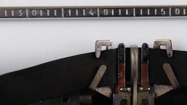 The word EMBARGO is typing on a retro typewriter.