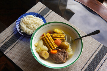 Olla de carne beef soup with vegetables, corn, potato, chayote, plantain, carrot, and beef. Typical...