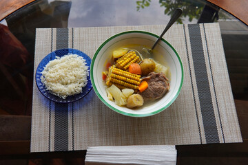 Olla de carne beef soup with vegetables, corn, potato, chayote, plantain, carrot, and beef. Typical...